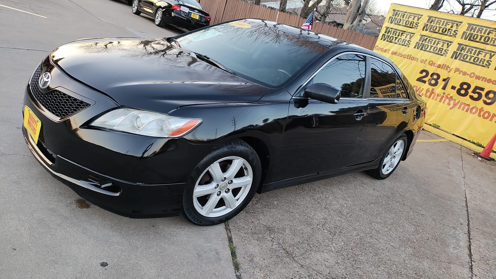 2007 Toyota Camry (4T1BE46K07U) , located at 16710 Clay Rd., Houston, TX, 77084, (281) 859-7900, 29.834864, -95.656166 - Photo#2